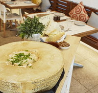 Flaming Cheese Wheel and Wine Experience Broadway - Pubs Adelaide