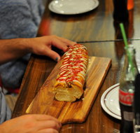 Paesano's Pizzeria with Double Dogs - Mentone - Pubs Adelaide